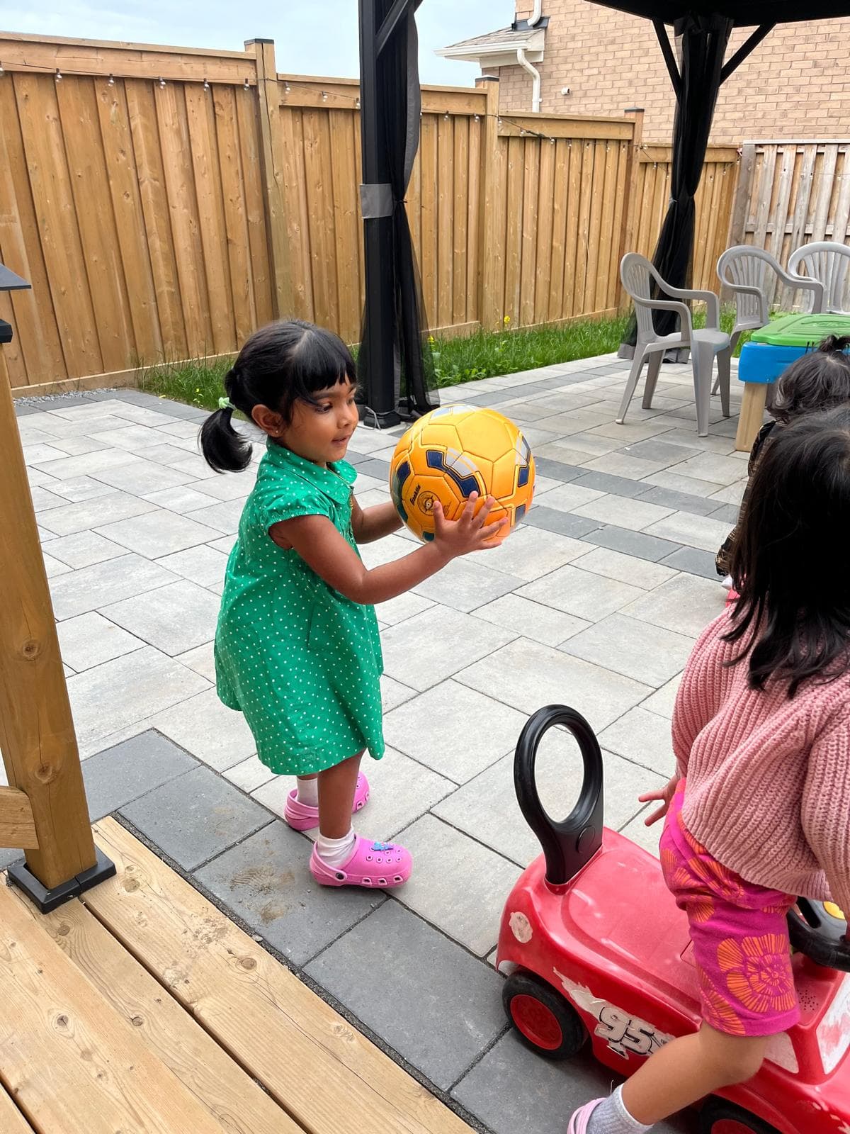 1 kid throwing soccer ball