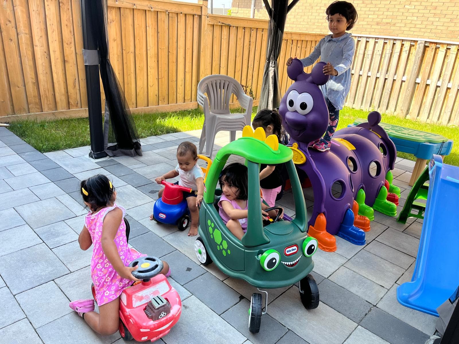 5 kids playing outside