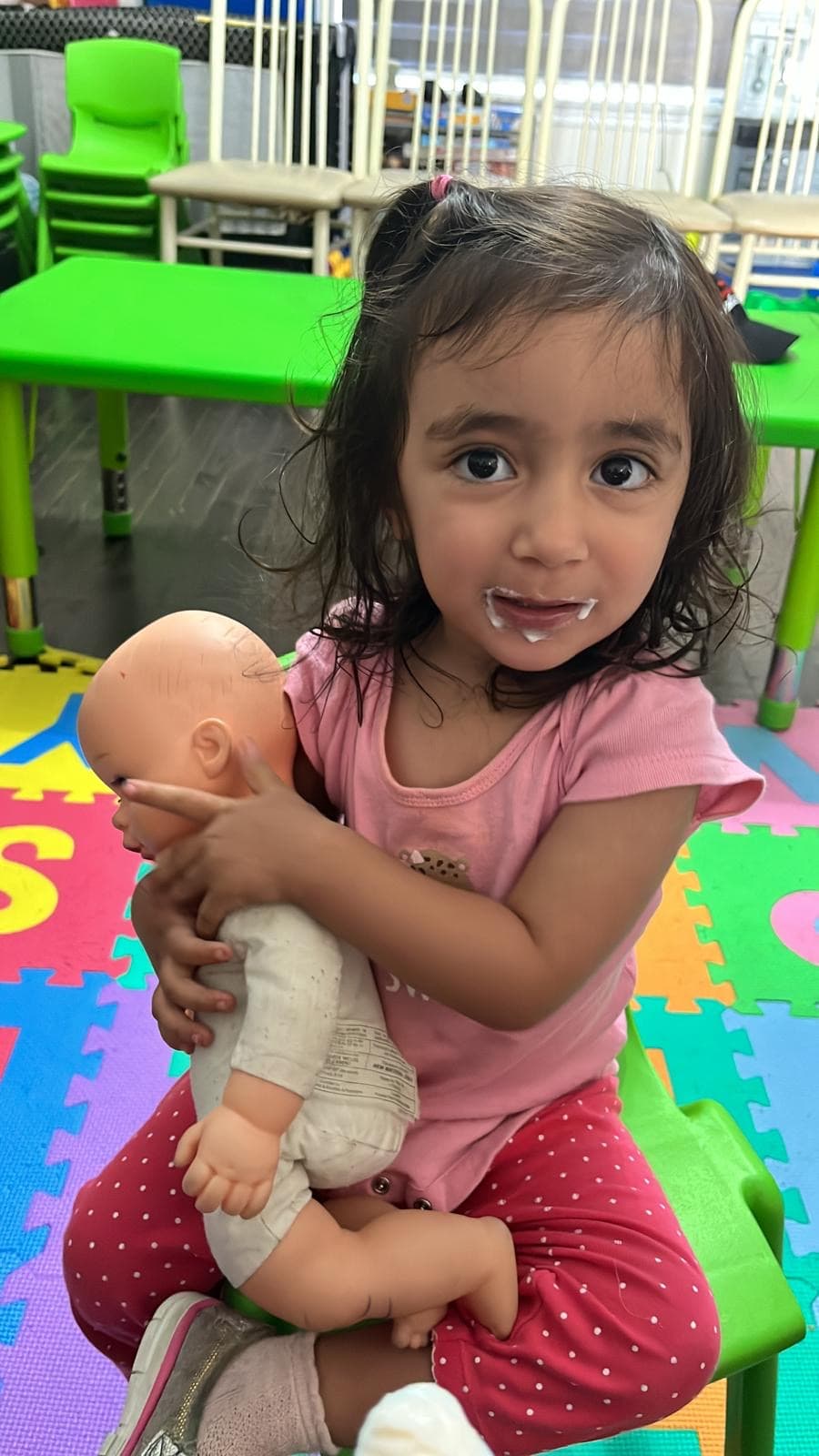 Kid face dirty playing with doll funny