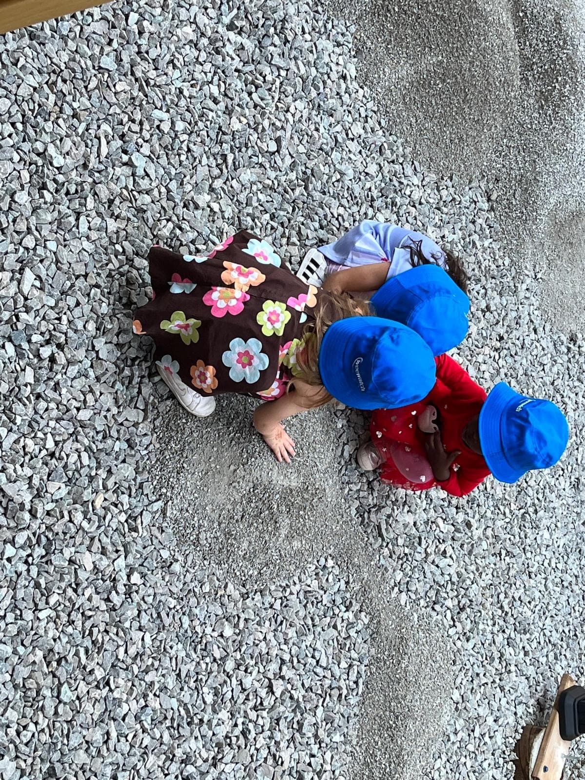 Playing with rocks 3 girls