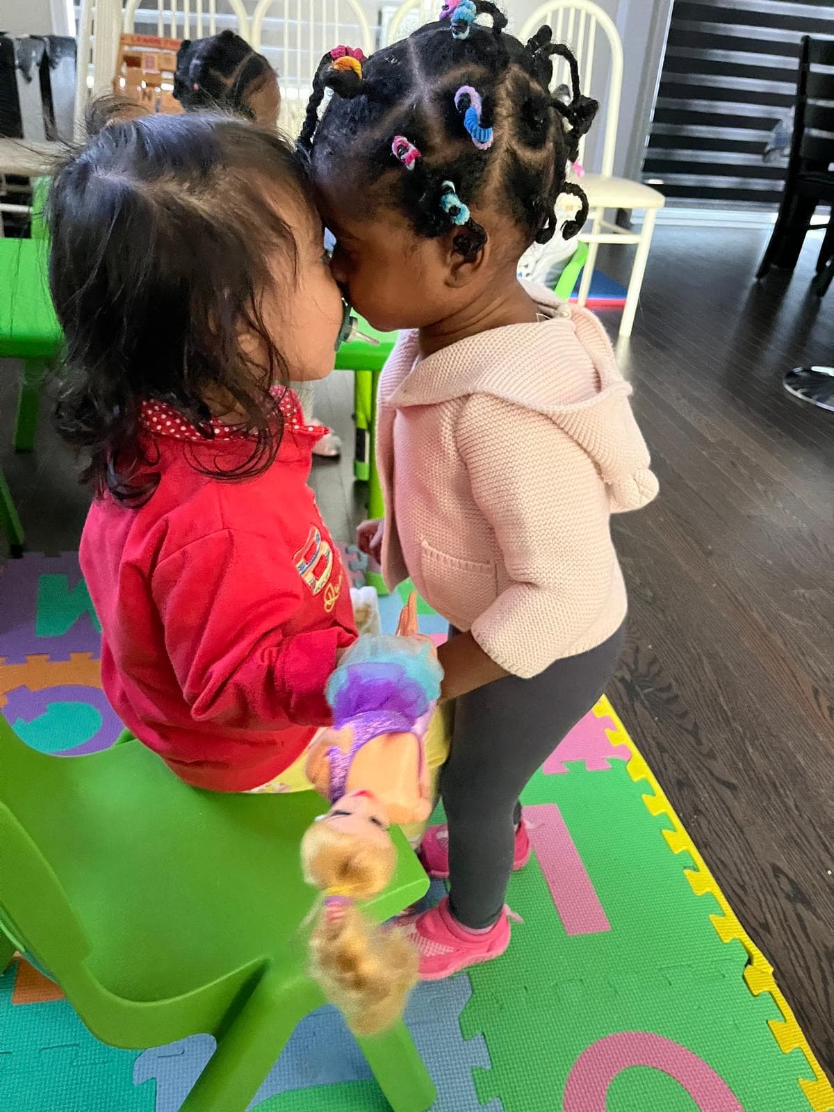 Two kids staring at each other funny